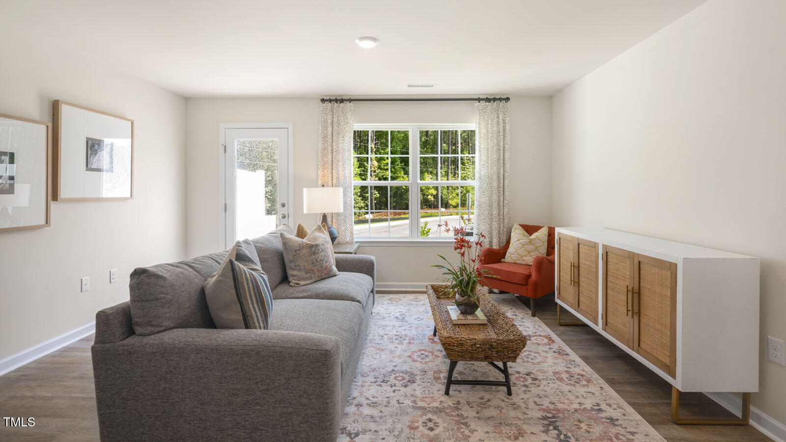 8537 Beckett Chase Way Raleigh, NC 27616 - Photo 17 of 32 a living room with furniture and a window