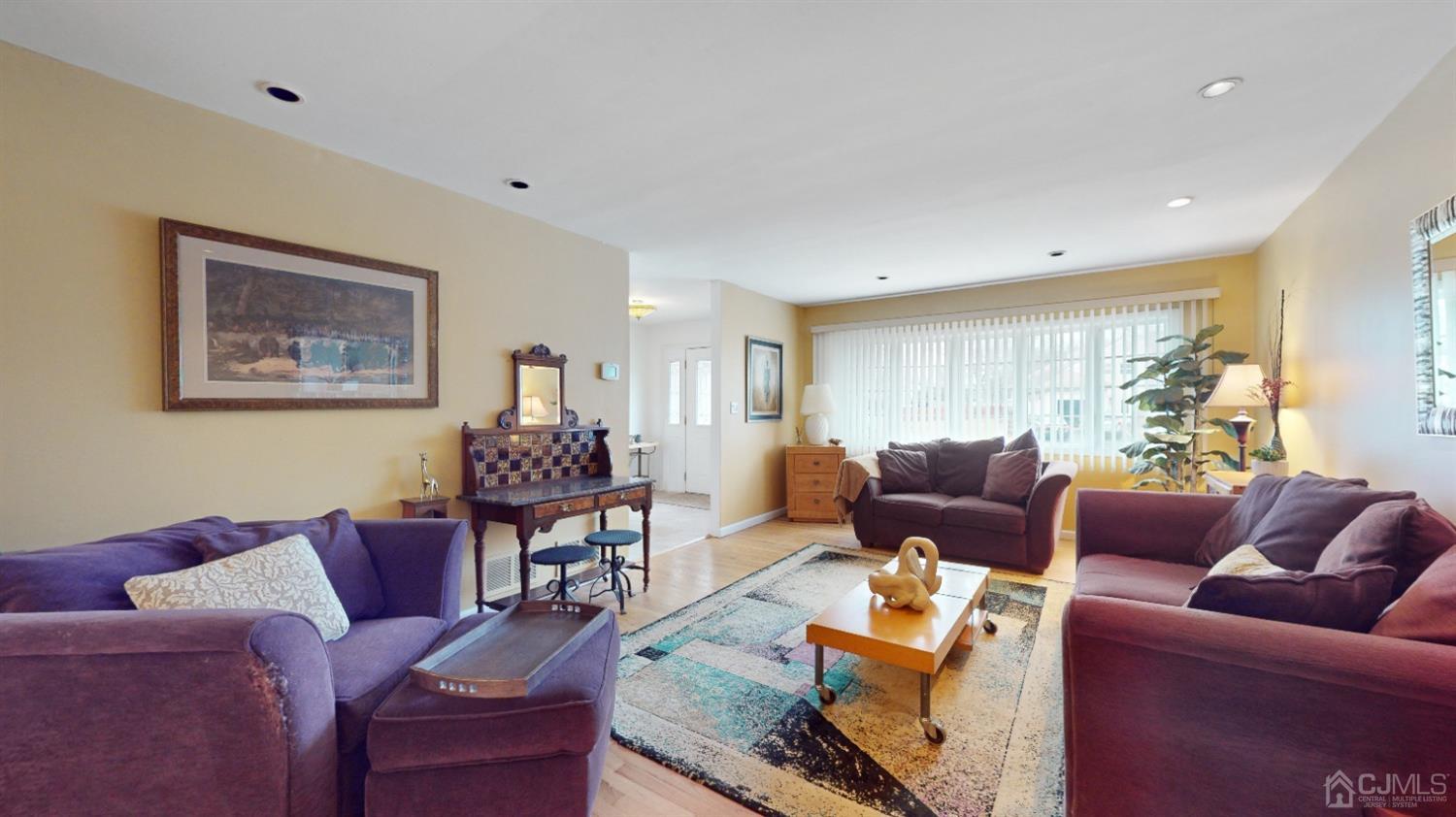 17 Timber Road Edison, NJ 08820 - Photo 12 of 37 a living room with furniture and a large window