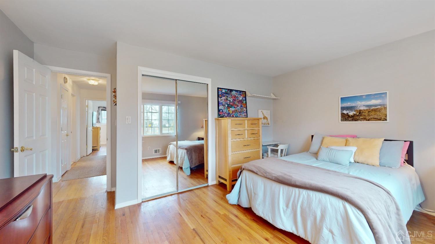 17 Timber Road Edison, NJ 08820 - Photo 17 of 37 a bedroom with a bed and wooden floor