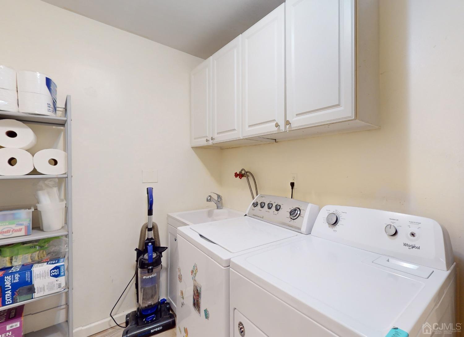 17 Timber Road Edison, NJ 08820 - Photo 21 of 37 a utility room with dryer and washer