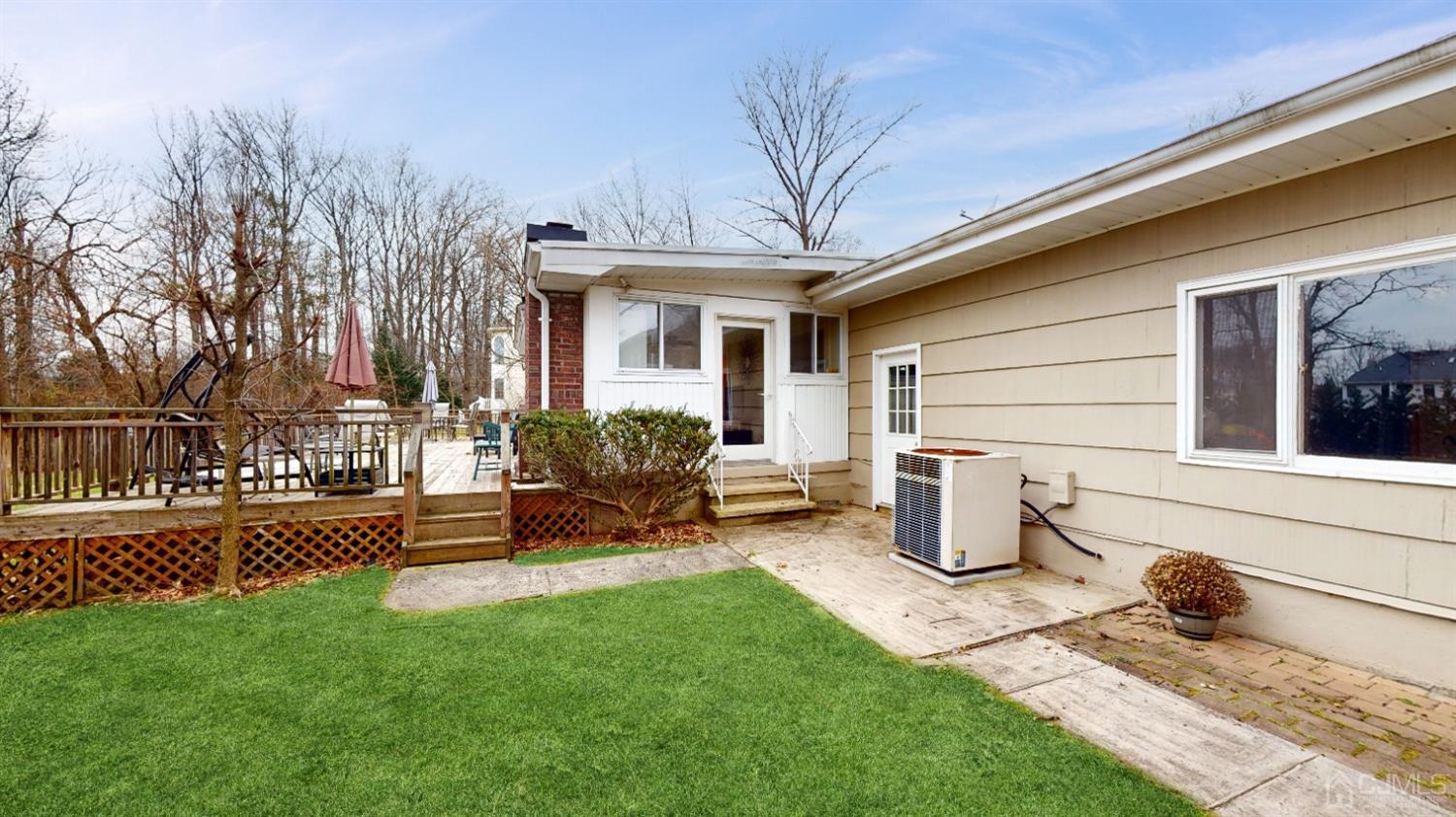 17 Timber Road Edison, NJ 08820 - Photo 29 of 37 a view of a house with backyard and sitting area