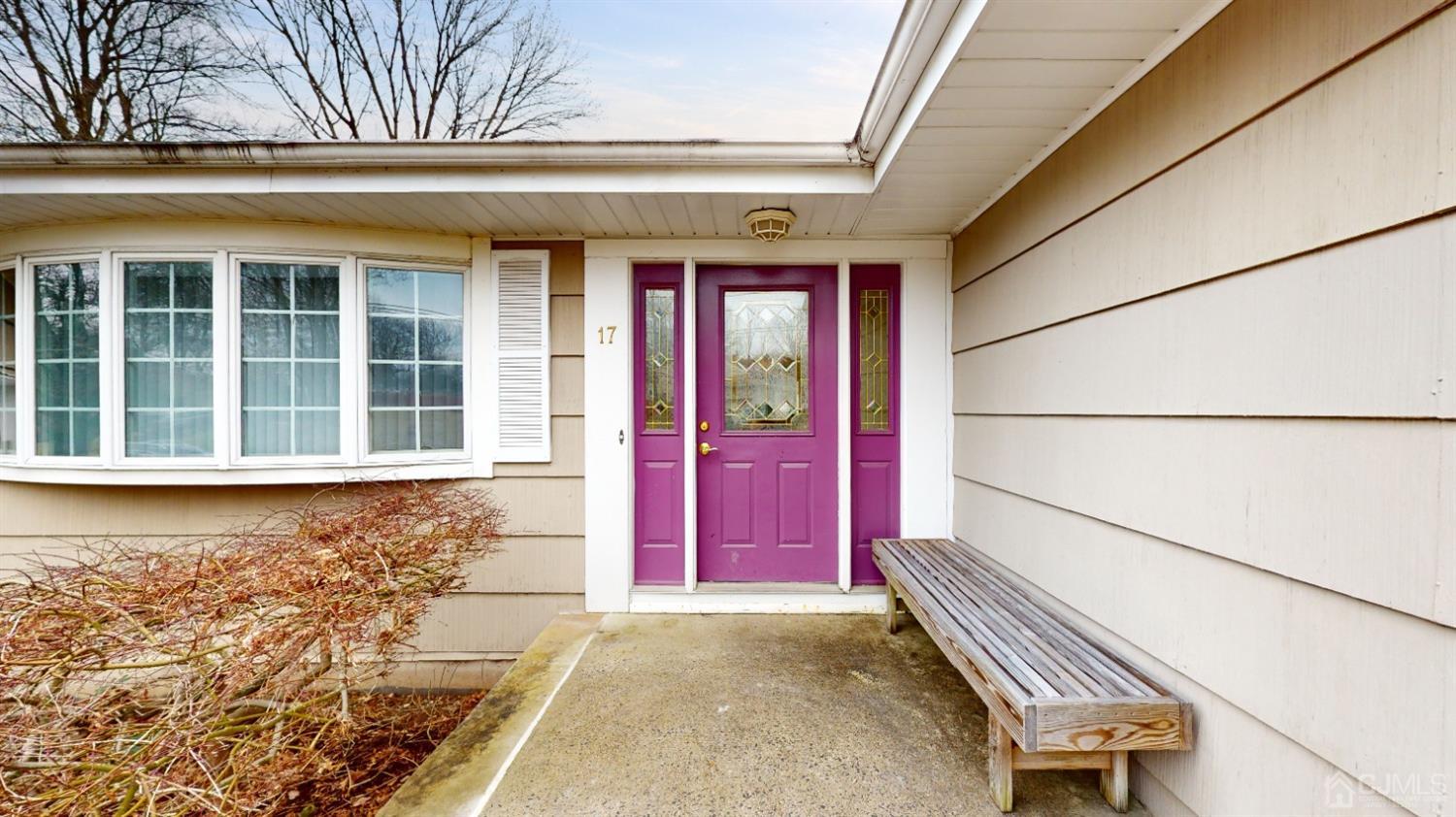 17 Timber Road Edison, NJ 08820 - Photo 3 of 37 a view of a house with a large window and wooden fence