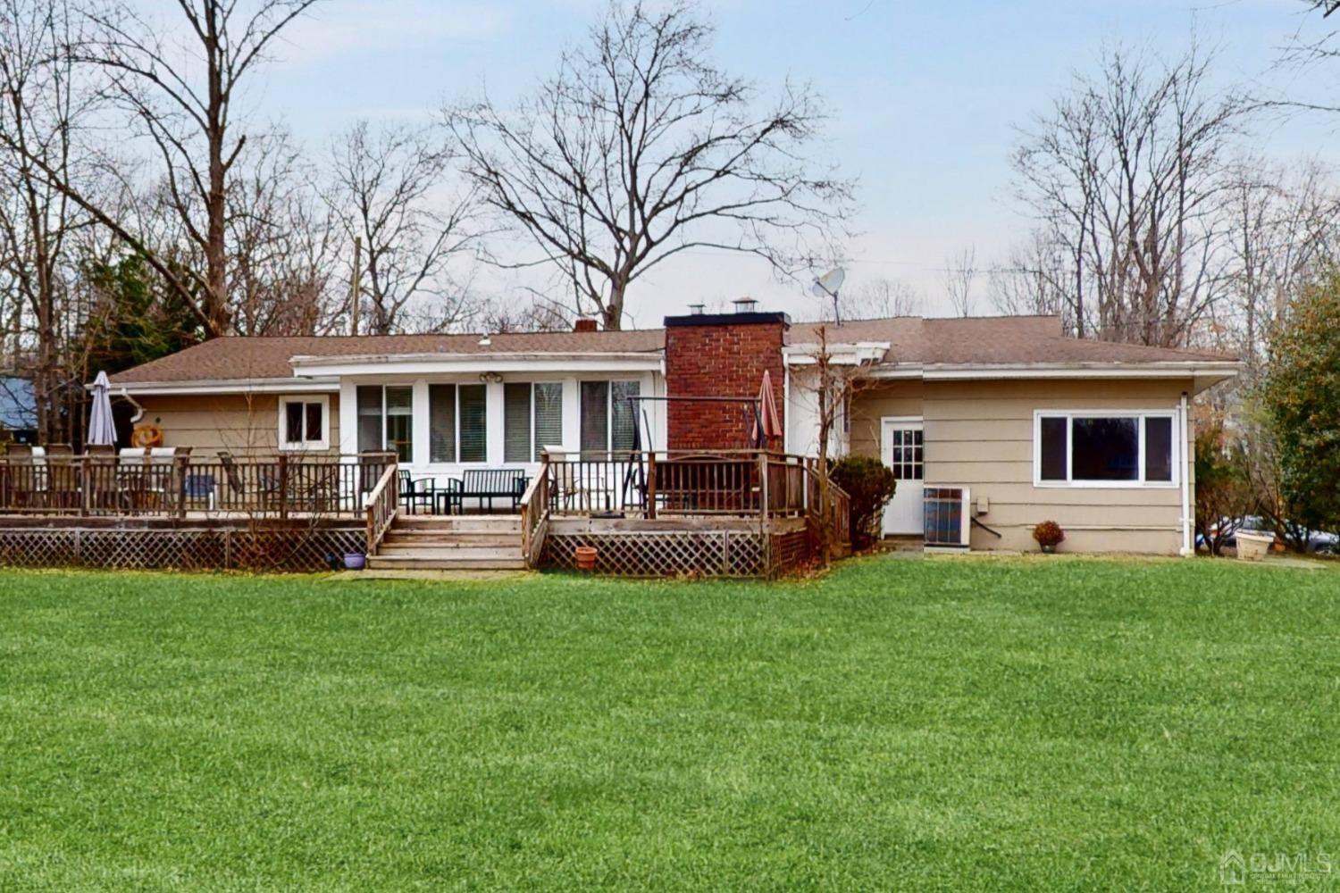 17 Timber Road Edison, NJ 08820 - Photo 33 of 37 a house view with a sitting space and garden