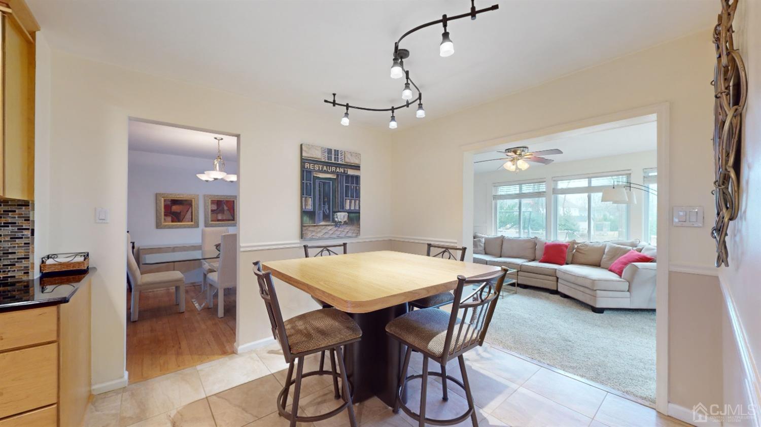 17 Timber Road Edison, NJ 08820 - Photo 7 of 37 a view of a dining room with furniture and a chandelier