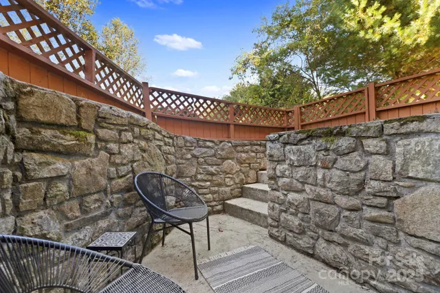 a outdoor space with wooden benches