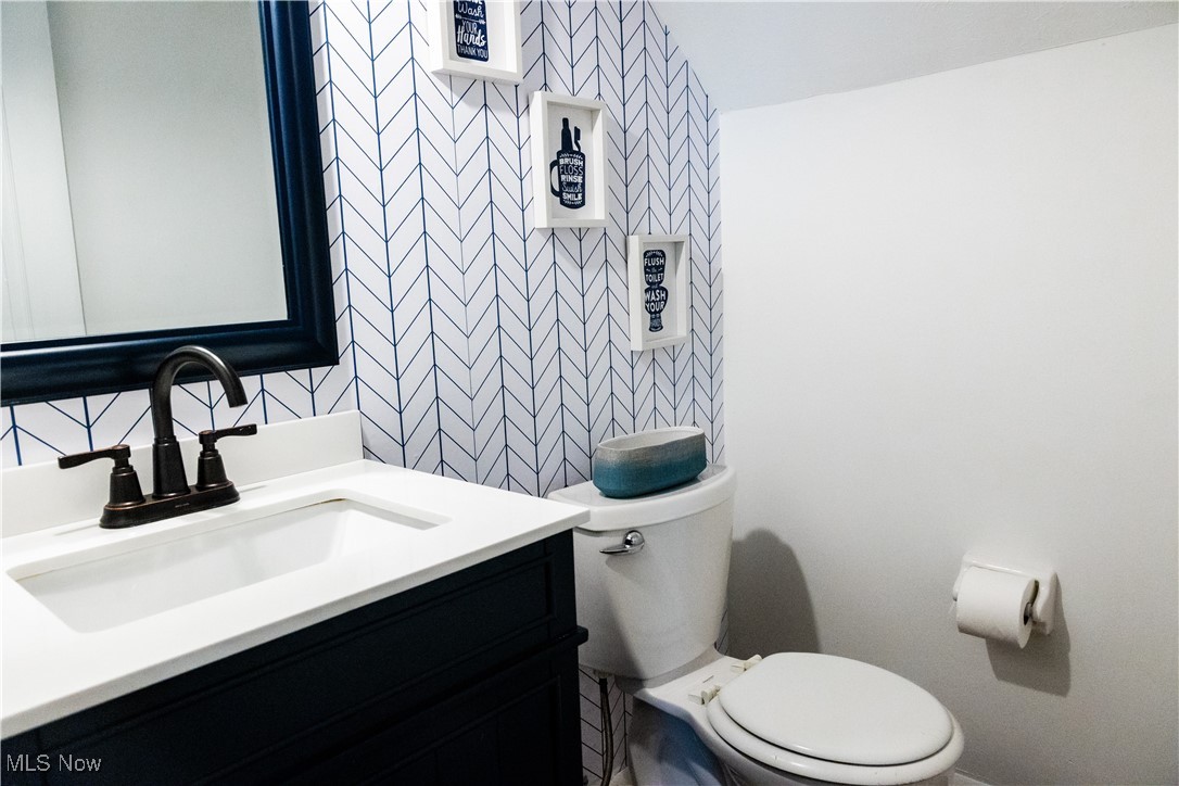 5861 Lee Avenue North Ridgeville, OH 44039 - Photo 16 of 20 Bathroom featuring vanity and toilet