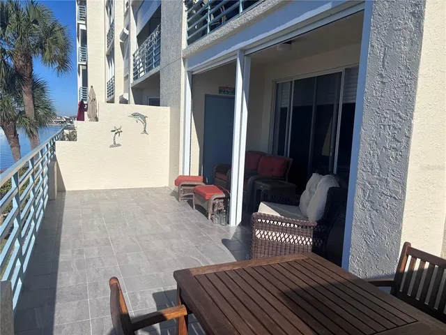 a room with gym equipment and a large window