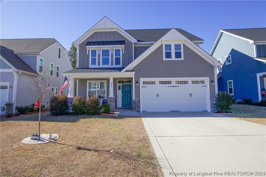 474 Kerr Lake Road Aberdeen, NC 28315 - Photo 1 of 47 a front view of a house with a yard