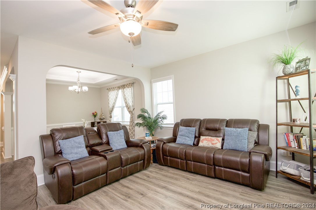 474 Kerr Lake Road Aberdeen, NC 28315 - Photo 12 of 47 a living room with furniture and a large window