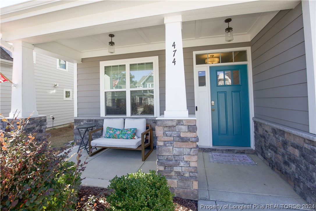 474 Kerr Lake Road Aberdeen, NC 28315 - Photo 2 of 47 a front view of a house with garden