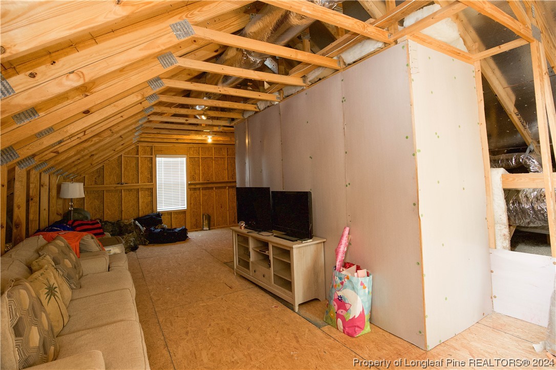 474 Kerr Lake Road Aberdeen, NC 28315 - Photo 36 of 47 a view of living room with furniture and a flat screen tv