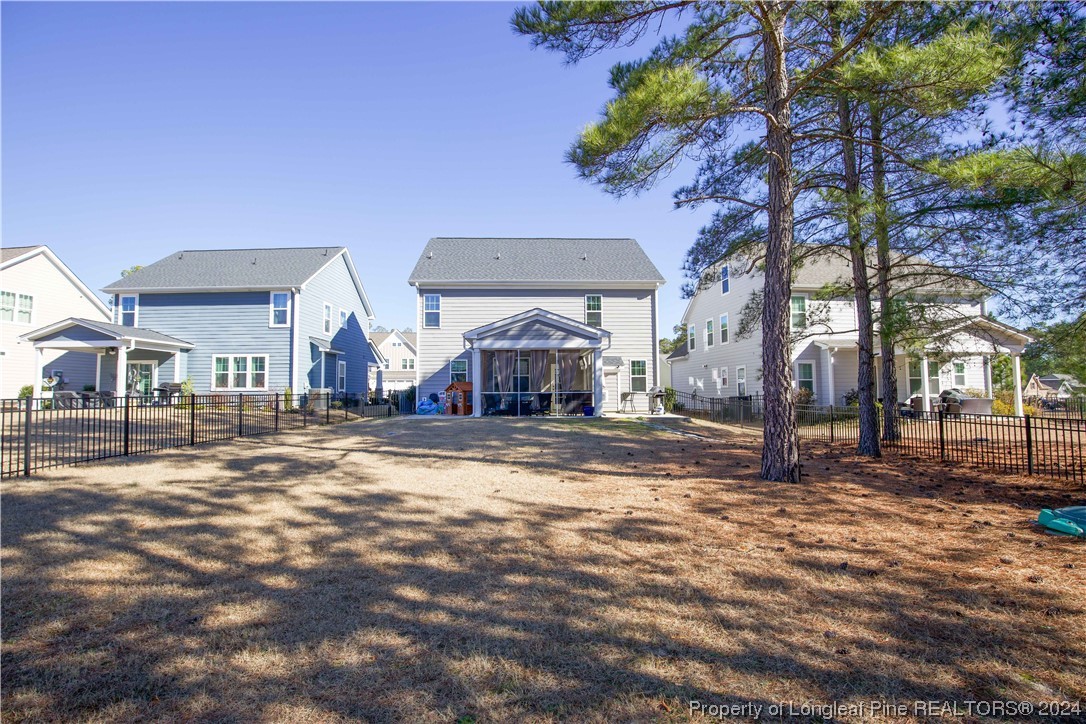 474 Kerr Lake Road Aberdeen, NC 28315 - Photo 45 of 47 a view of a large building with a street