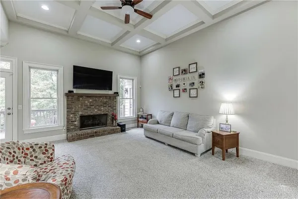 a kitchen with stainless steel appliances granite countertop a refrigerator stove a sink dishwasher and microwave oven