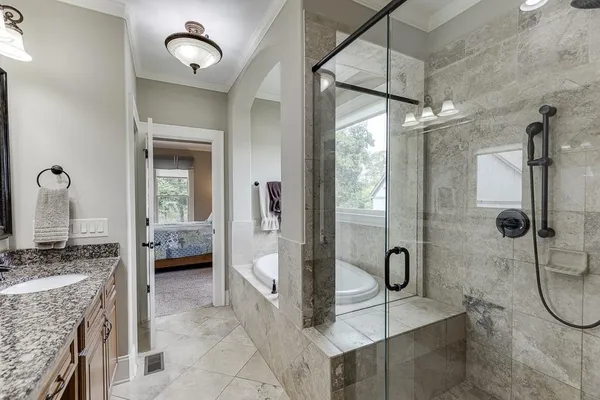 a view of balcony with wooden floor