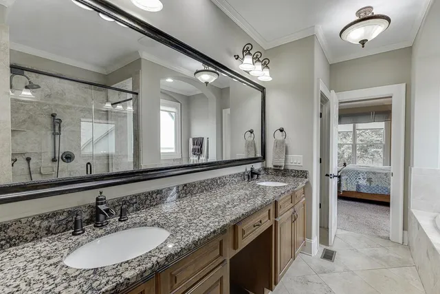 a view of a house with a backyard