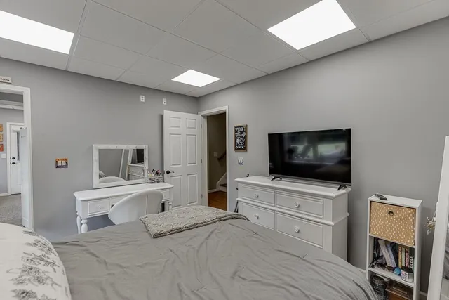 an aerial view of residential house with outdoor space and swimming pool