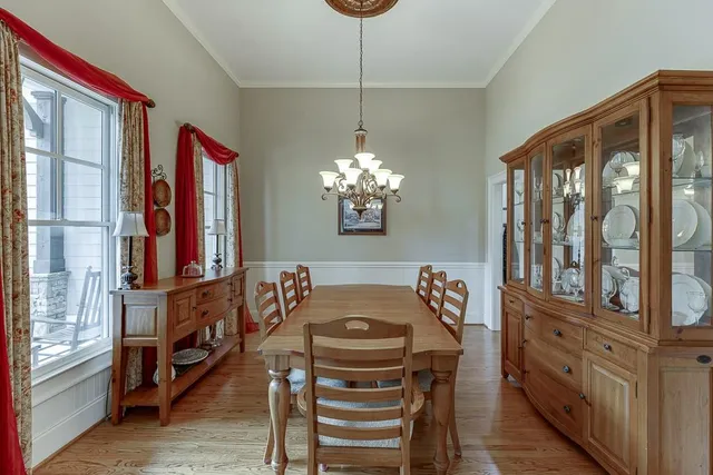 a living room with furniture fireplace and flat screen tv