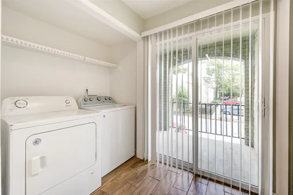 a utility room with dryer and washer