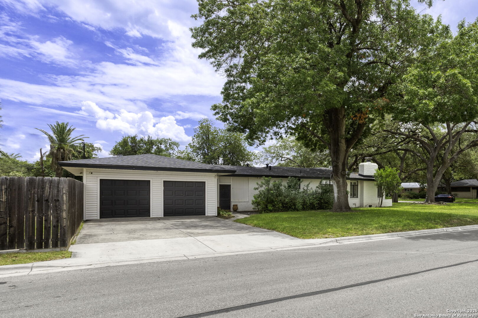 906 East Cedar Street Seguin, TX 78155 - Photo 2 of 17 a view of a house with a yard