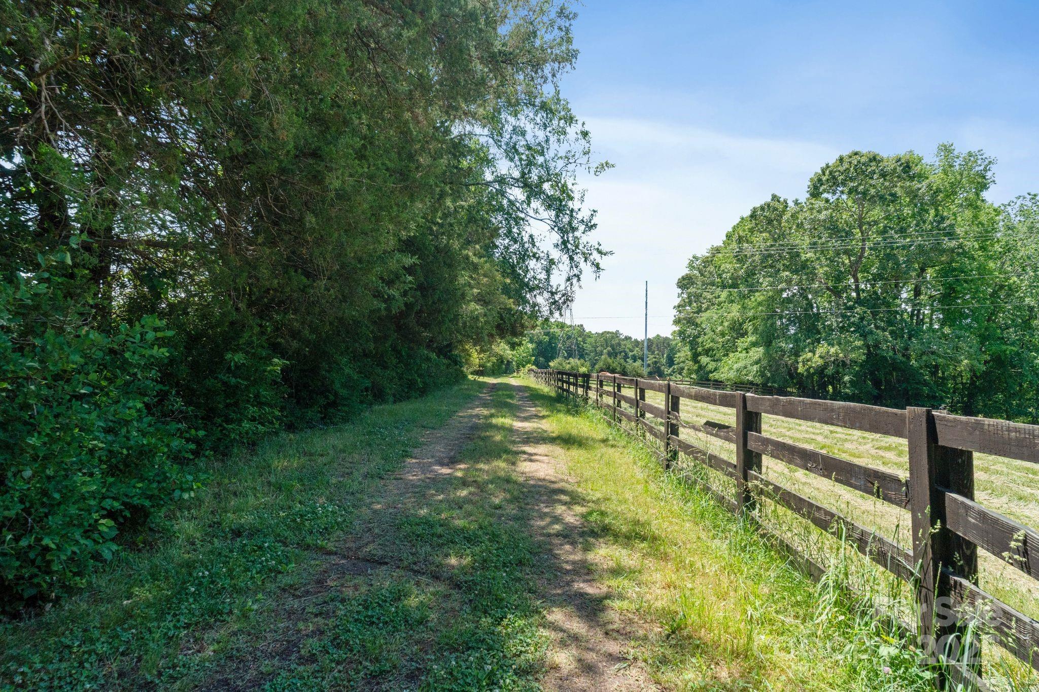 21121 Shearer Road, Unit 3 Davidson, NC 28036 - Photo 12 of 12 a view of swimming pool from a garden