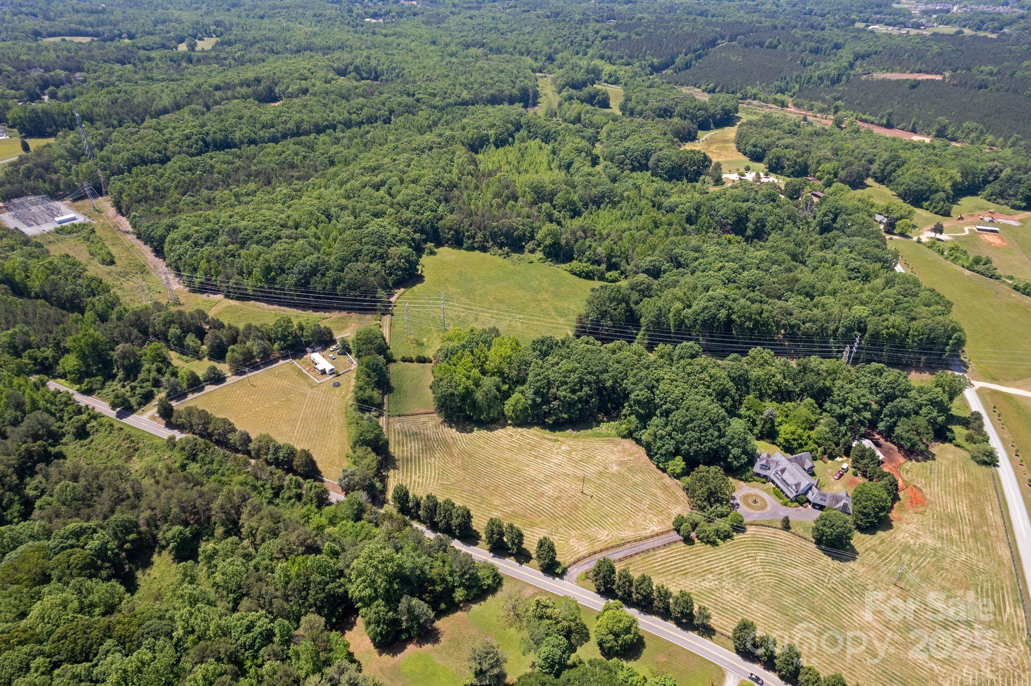 21121 Shearer Road, Unit 3 Davidson, NC 28036 - Photo 2 of 12 an aerial view of a house with a yard