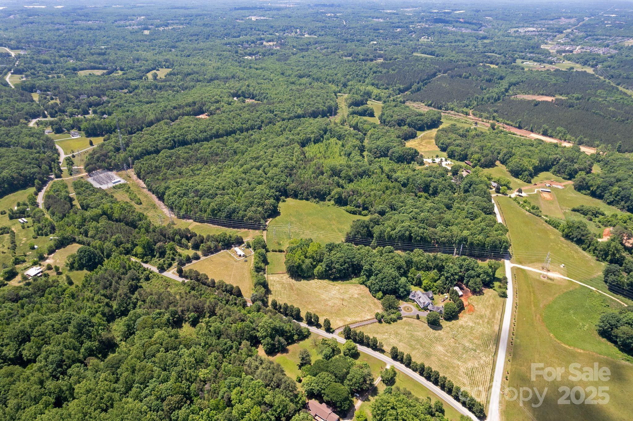 21121 Shearer Road, Unit 3 Davidson, NC 28036 - Photo 9 of 12 an aerial view of a houses with a yard