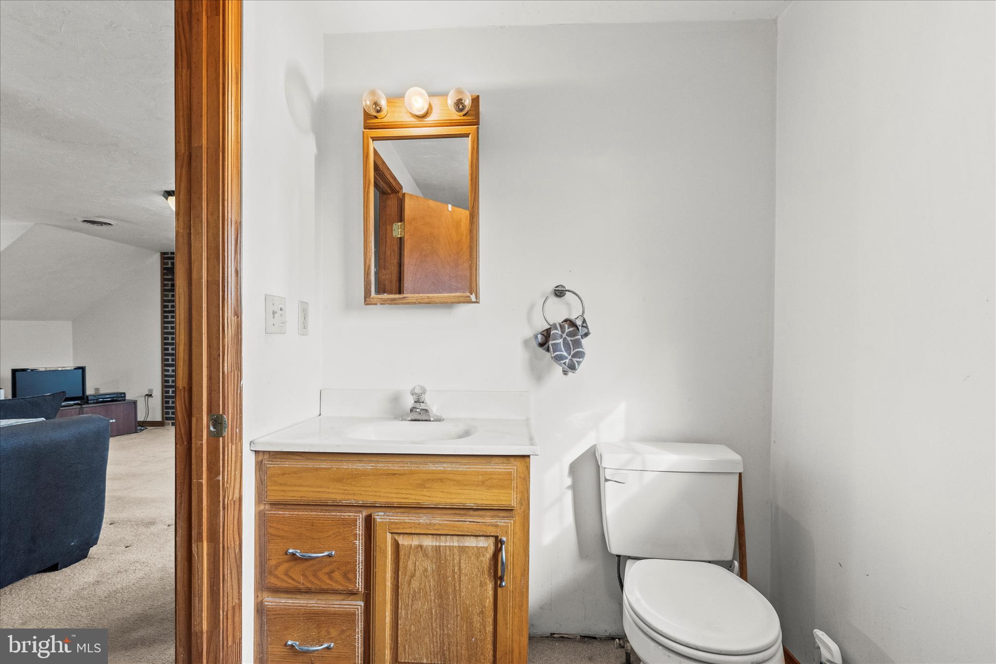 181 Gooseville Road New Oxford, PA 17350 - Photo 18 of 45 a bathroom with a toilet sink and mirror
