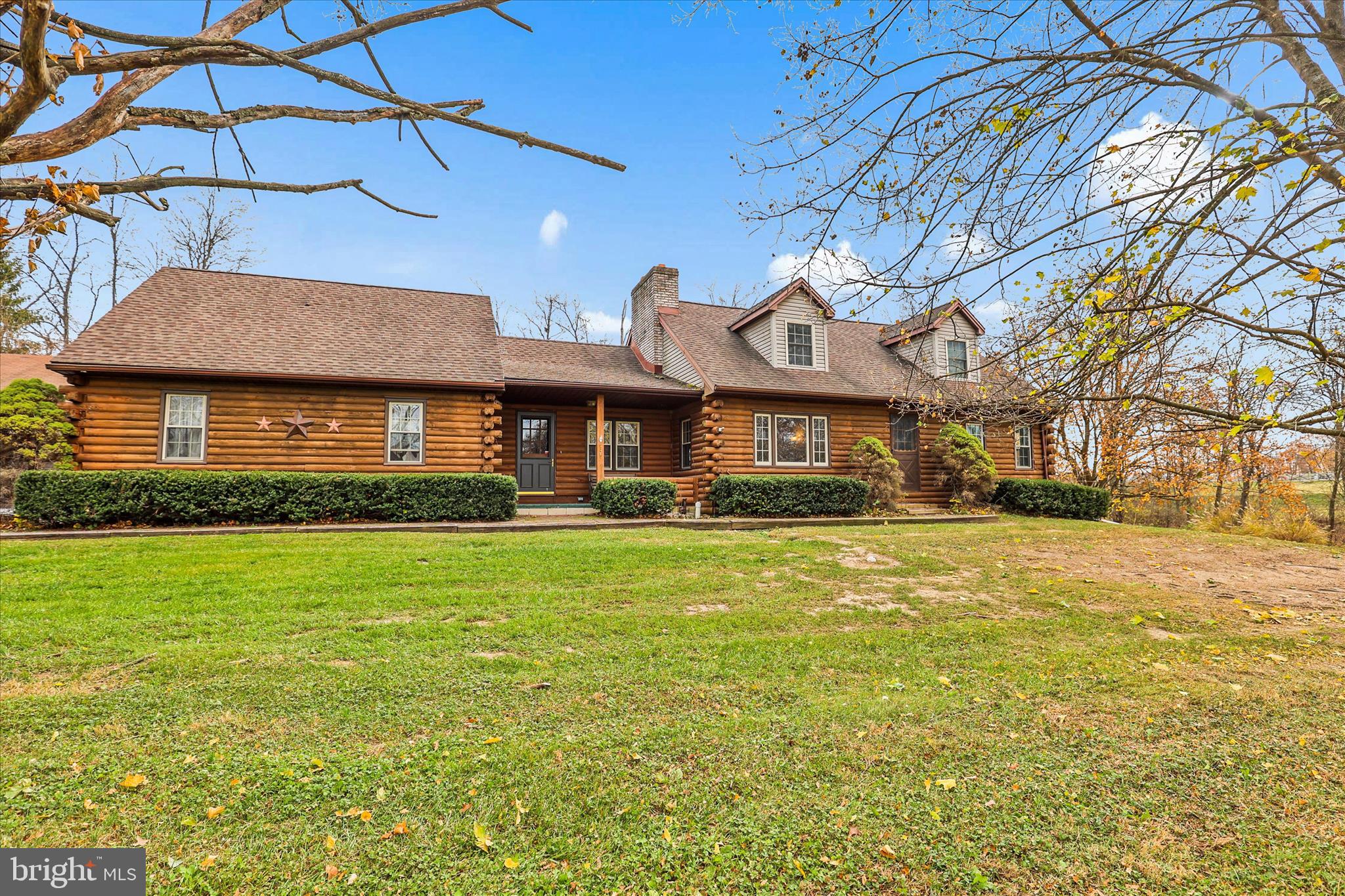 181 Gooseville Road New Oxford, PA 17350 - Photo 2 of 45 a front view of a building with a garden