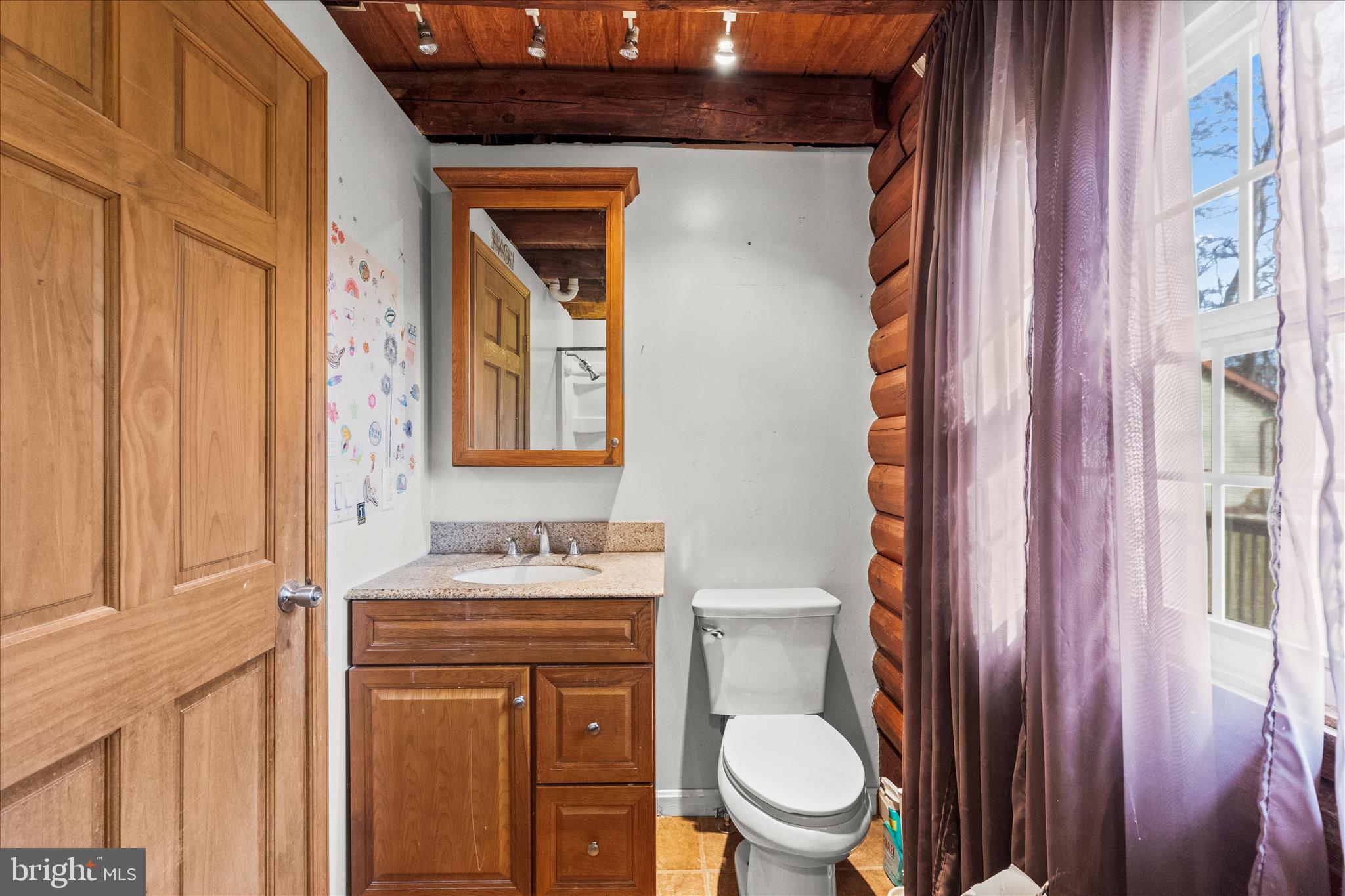 181 Gooseville Road New Oxford, PA 17350 - Photo 23 of 45 a bathroom with a toilet sink vanity and mirror