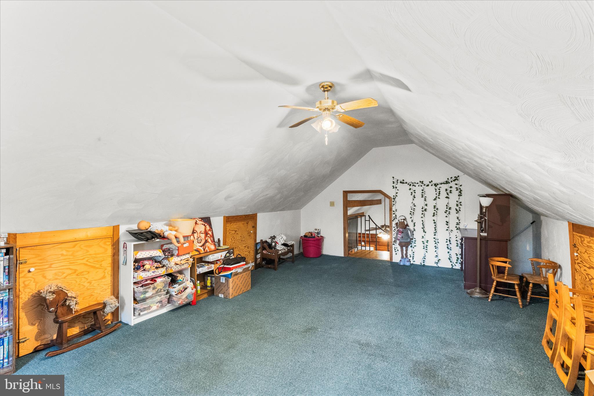 181 Gooseville Road New Oxford, PA 17350 - Photo 25 of 45 a view of a livingroom with toys and a chandelier