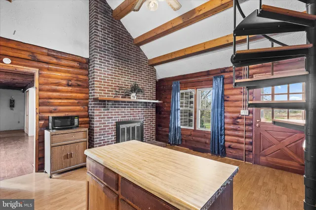 a view of a dinning table and chairs in the patio