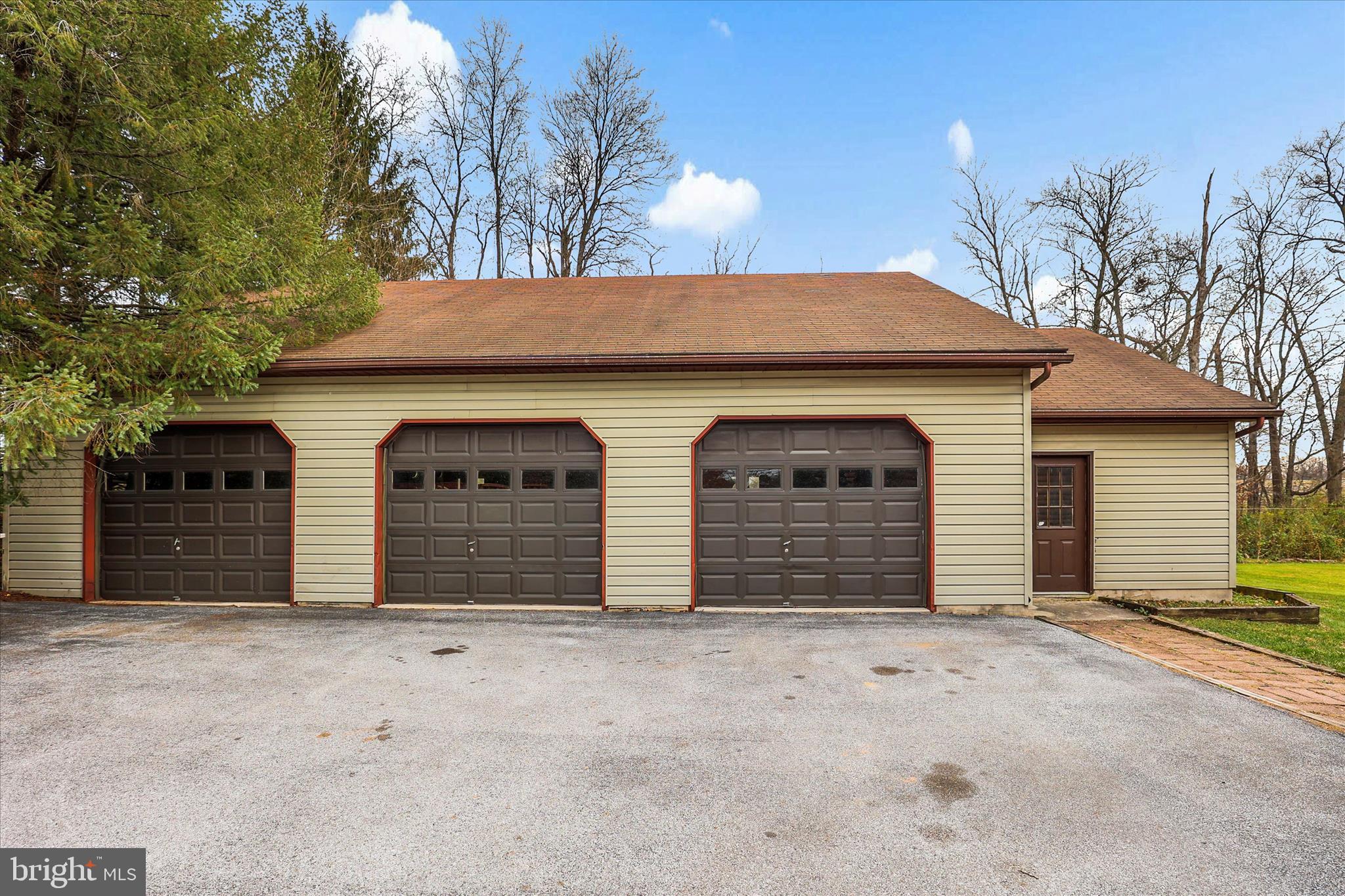 181 Gooseville Road New Oxford, PA 17350 - Photo 37 of 45 a front view of a house with a yard and garage