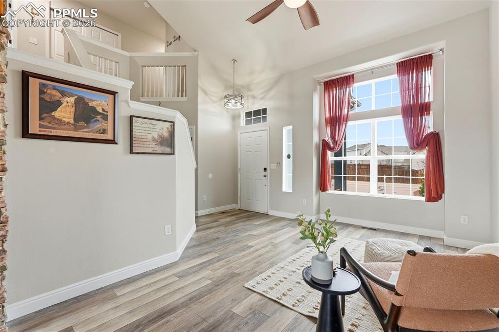 6907 Shimmering Leaf Road Colorado Springs, CO 80908 - Photo 4 of 49 a view of a livingroom with furniture and window