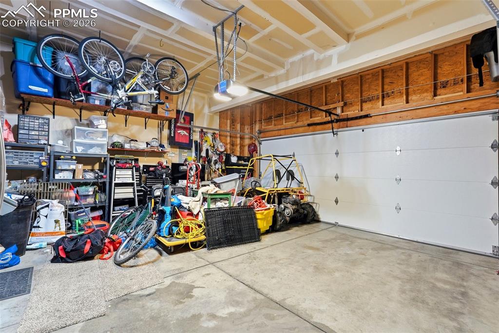 6907 Shimmering Leaf Road Colorado Springs, CO 80908 - Photo 42 of 49 a view of a storage area with bicycles