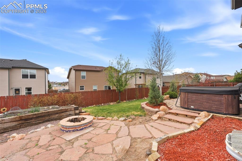 6907 Shimmering Leaf Road Colorado Springs, CO 80908 - Photo 47 of 49 a view of outdoor space yard and patio