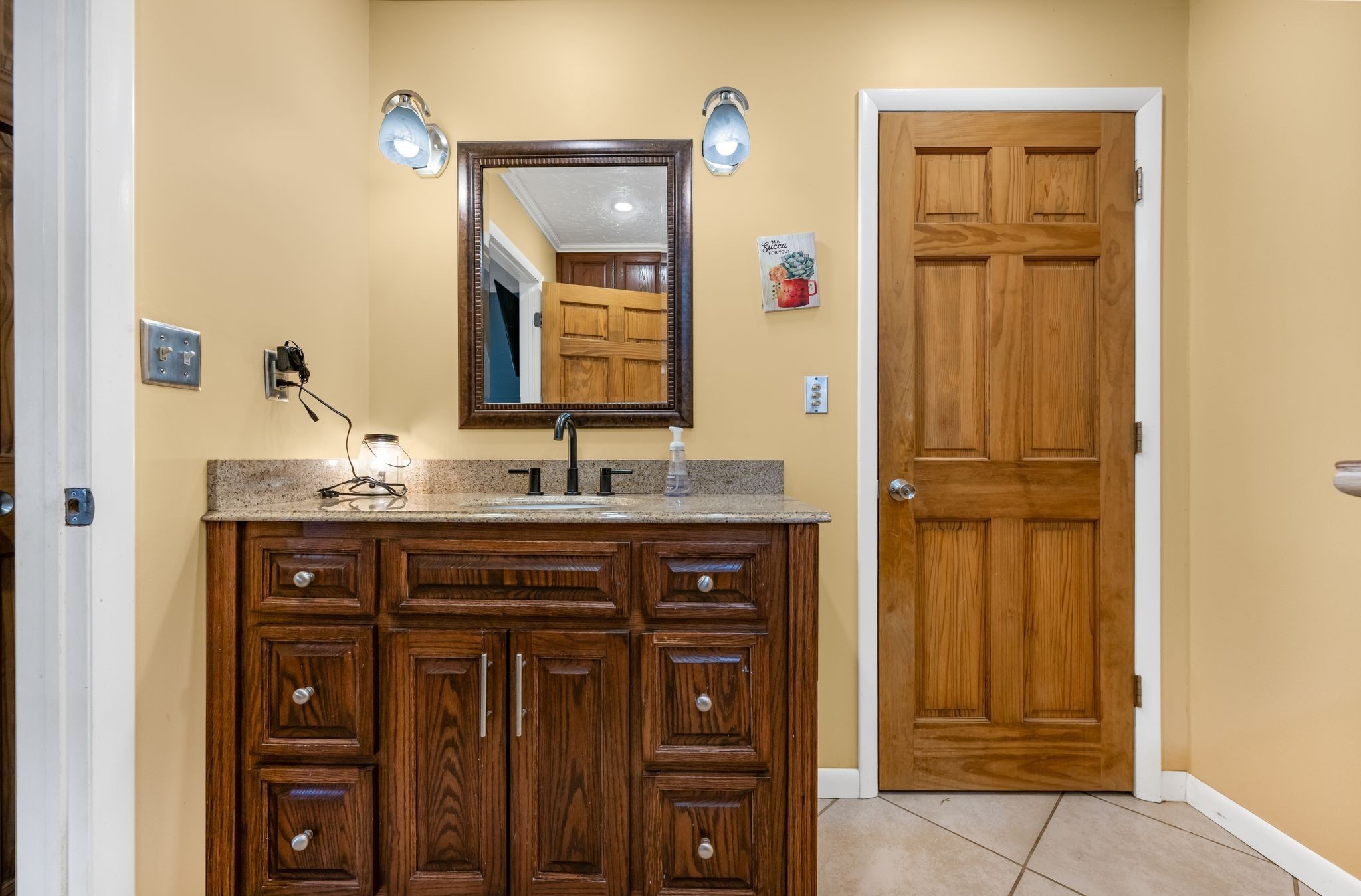 298 Langford Road Waverly, TN 37185 - Photo 21 of 53 a bathroom with a sink and a mirror