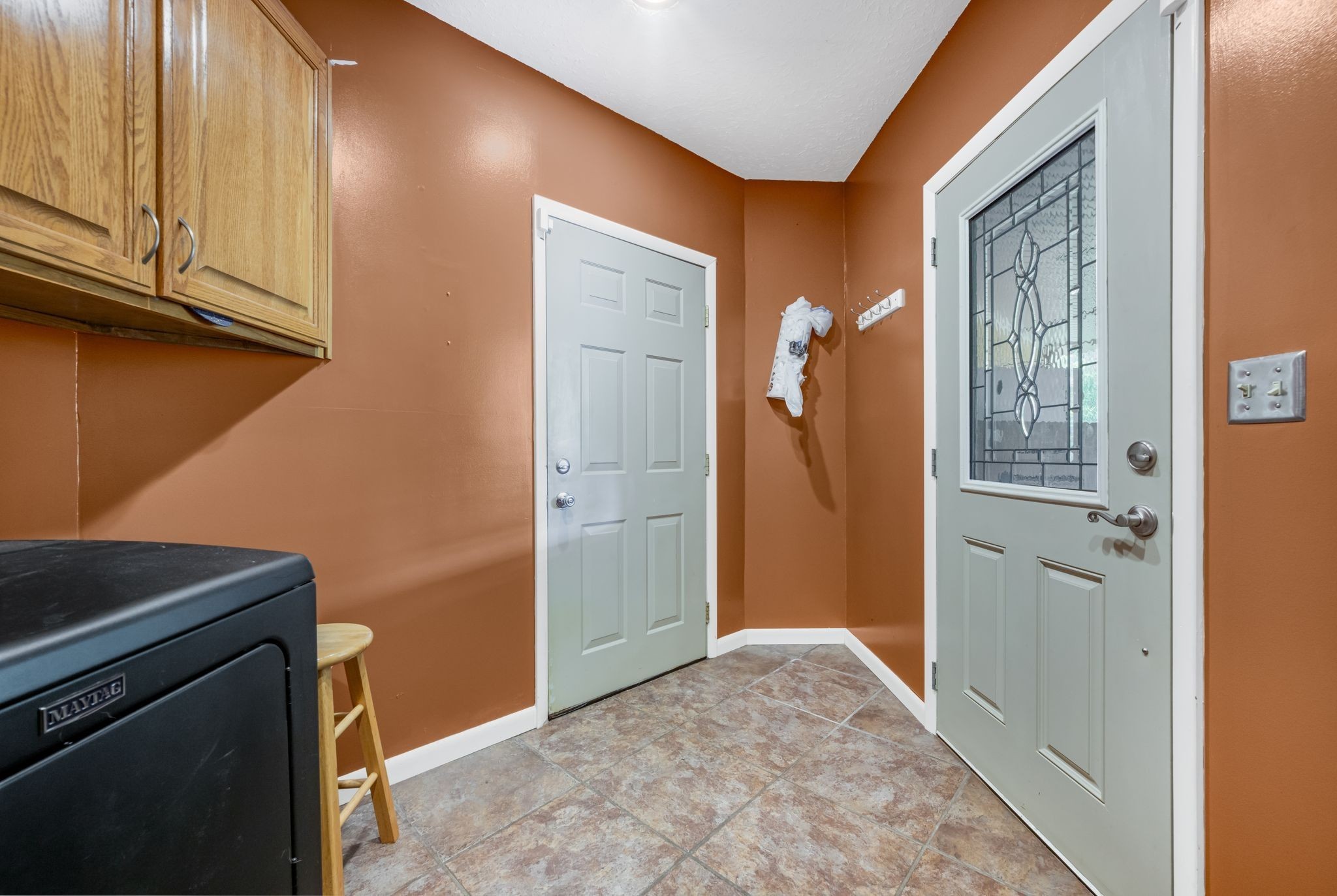 298 Langford Road Waverly, TN 37185 - Photo 25 of 53 a view of a livingroom with wooden floor and cabinet