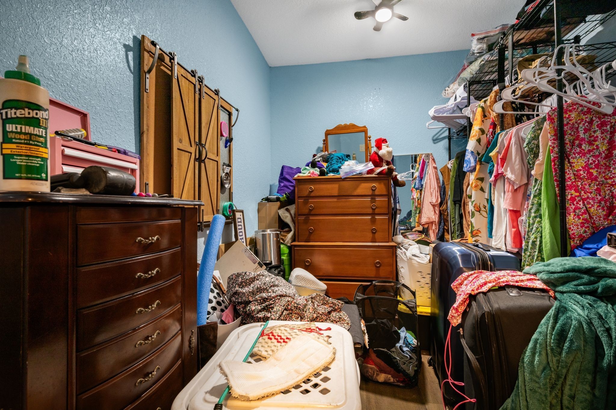 298 Langford Road Waverly, TN 37185 - Photo 28 of 53 a bed room with a bed and a closet