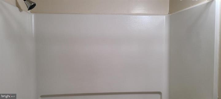 11601 Lighthouse Drive Laurel, MD 20708 - Photo 16 of 21 Sleek, modern shower space awaits you.