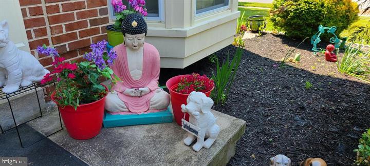 11601 Lighthouse Drive Laurel, MD 20708 - Photo 4 of 21 Tranquil garden with serene Buddha.