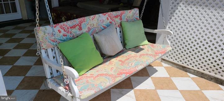 11601 Lighthouse Drive Laurel, MD 20708 - Photo 8 of 21 Charming swing for serene moments.