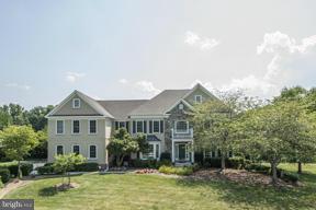2101 Link Road Silver Spring, MD 20905 - Photo 1 of 30 a front view of a house with a yard