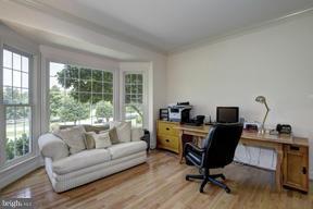 2101 Link Road Silver Spring, MD 20905 - Photo 11 of 30 a view of a workspace with furniture and a window