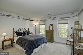 2101 Link Road Silver Spring, MD 20905 - Photo 20 of 30 a bedroom with a bed and a window
