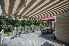 2101 Link Road Silver Spring, MD 20905 - Photo 26 of 30 a view of house with deck and outdoor seating