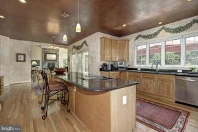 2101 Link Road Silver Spring, MD 20905 - Photo 6 of 30 a kitchen with counter top space a sink and appliances