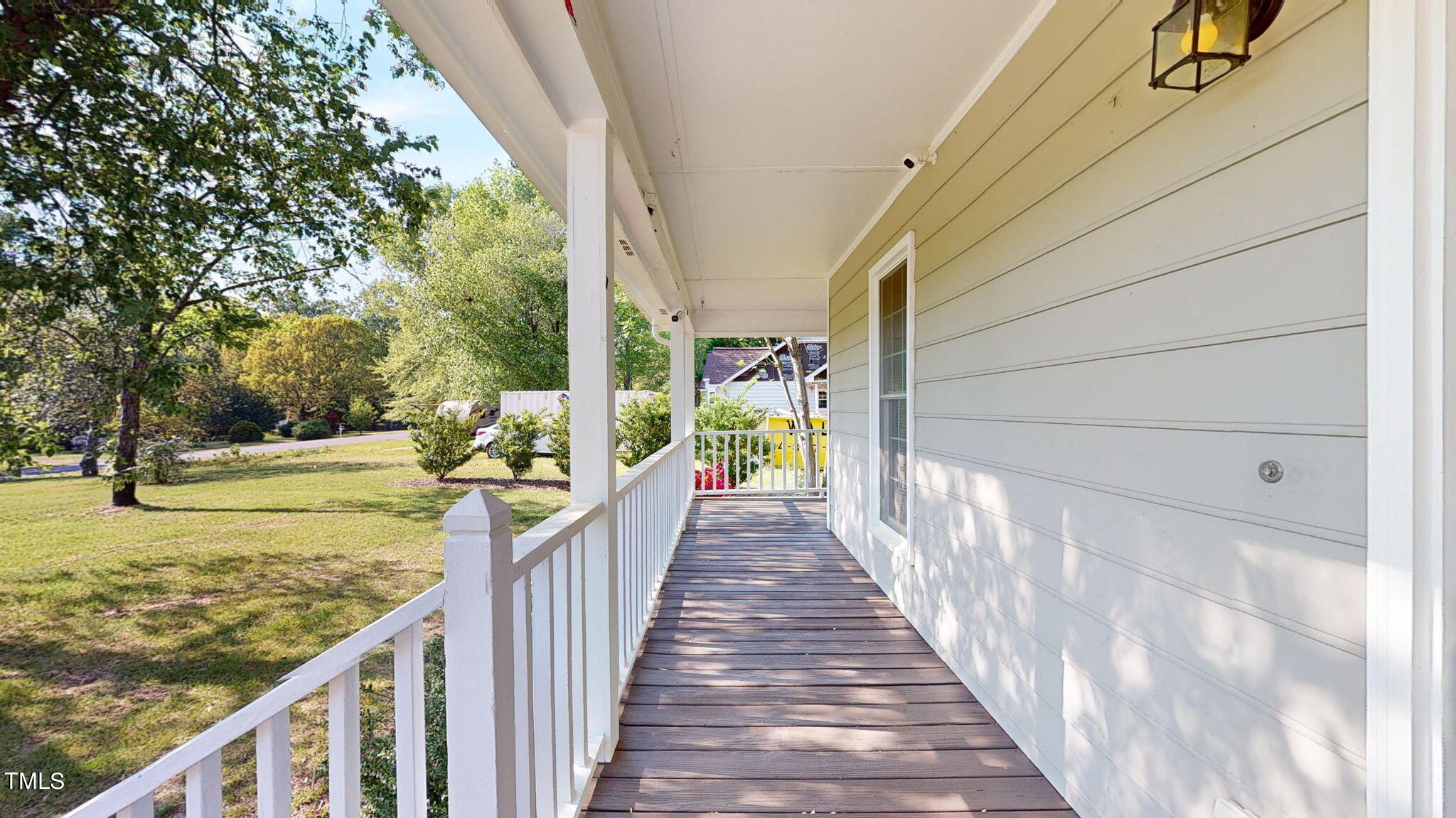 3404 Cartway Lane Raleigh, NC 27616 - Photo 3 of 3 a view of a pathway of a house with large trees