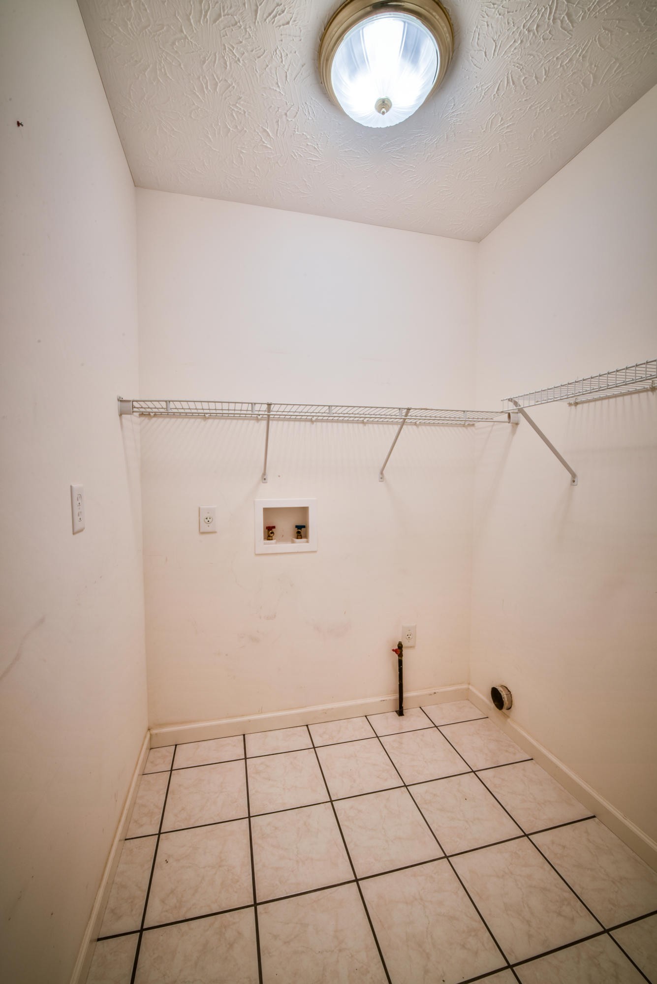 1120 Autumn Breeze Road Newport, TN 37821 - Photo 18 of 38 a view of a utility room with racks on the wall
