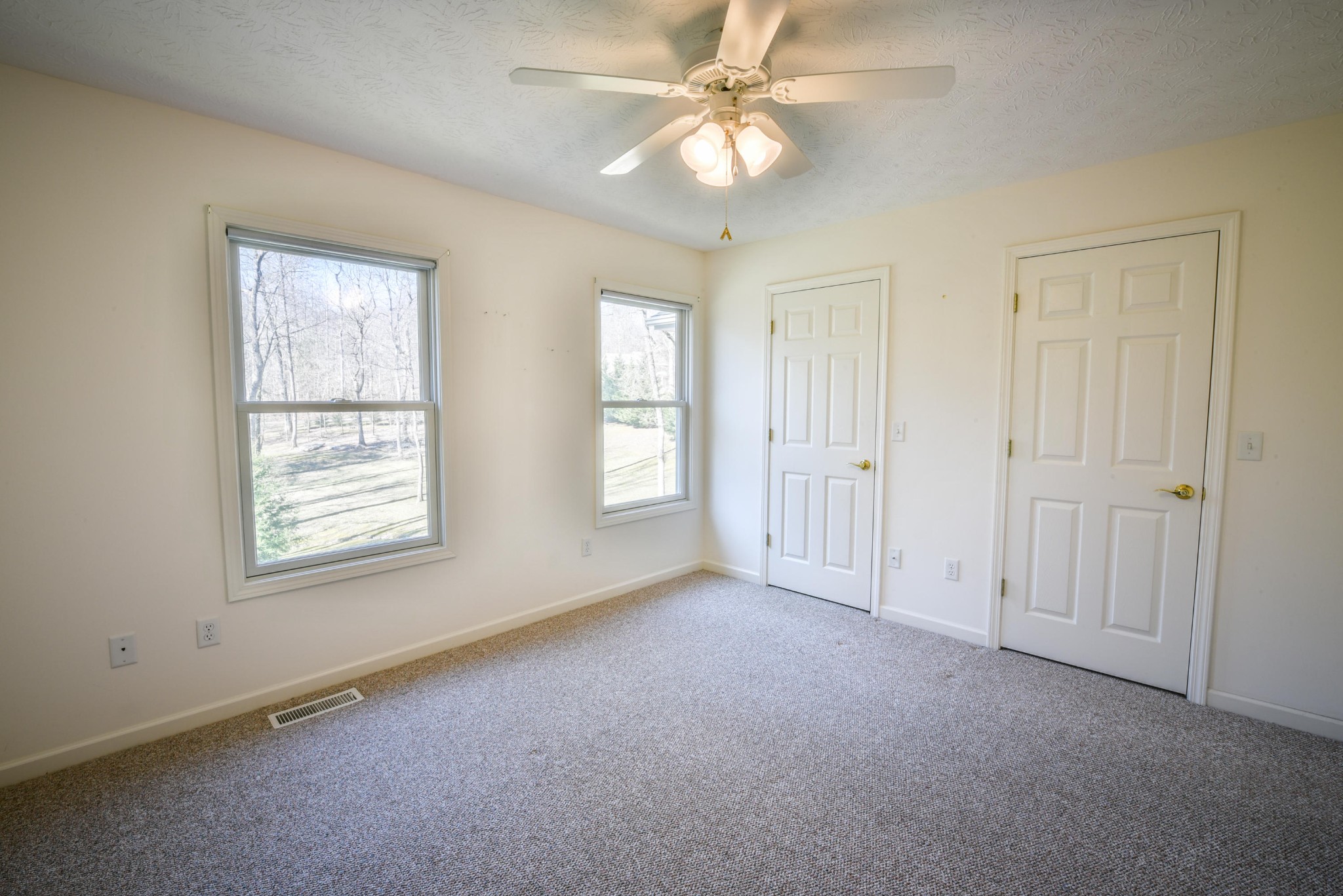 1120 Autumn Breeze Road Newport, TN 37821 - Photo 26 of 38 an empty room with windows and fan