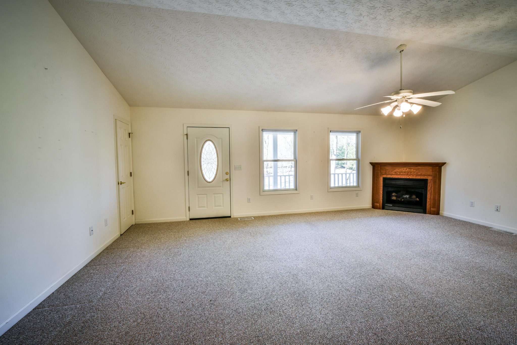 1120 Autumn Breeze Road Newport, TN 37821 - Photo 8 of 38 an empty room with windows and fireplace